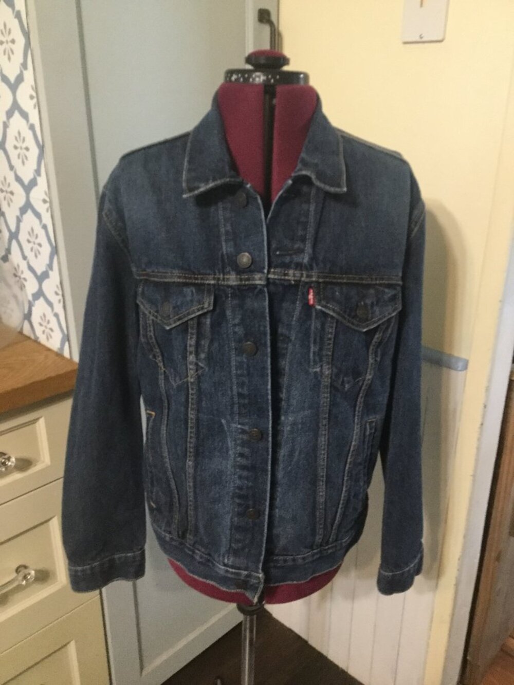 Levi Straus & Co rigid denim jacket size medium blue measures 22" across Levi's